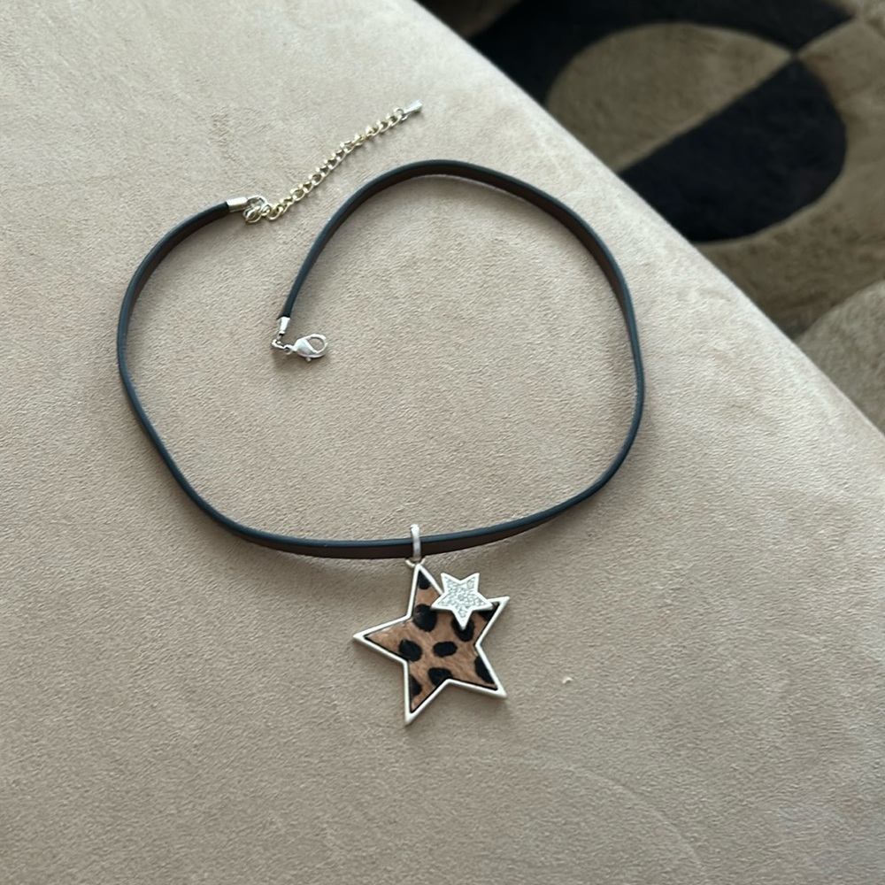 Brown leather necklace with suede star